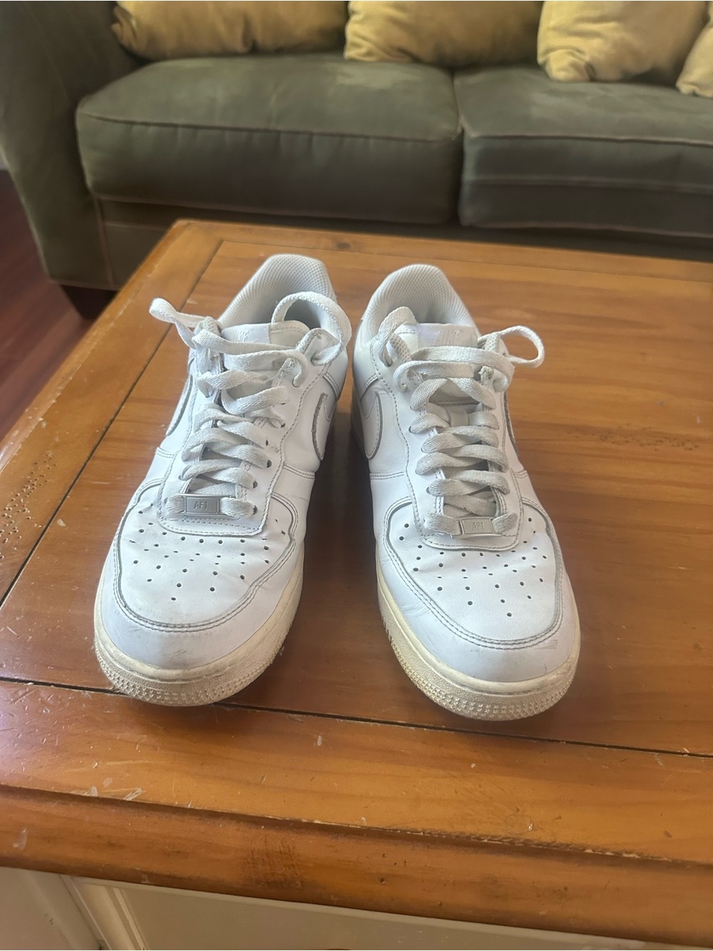 Nike Air Force 1 women’s White Low-Top Leather Sneakers with Lace-Up Closure
